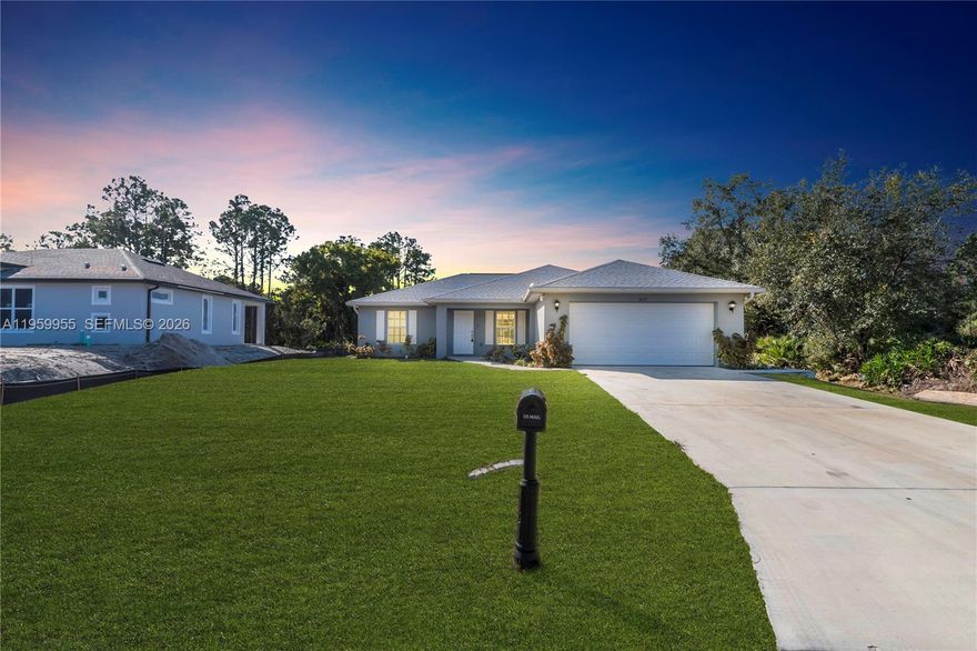 Beautiful 3-bedroom, 2-bath home featuring an open-concept layout with cathedral ceilings that enhance the sense of space and natural light. Built with durable concrete block construction, the home offers a modern kitchen with an island and stainless steel appliances, along with a covered lanai ideal for enjoying the Florida lifestyle. The garage has been converted into additional finished living space, providing flexible use options such as a guest area, home office, or multi-purpose room. All information is deemed reliable but not guaranteed.