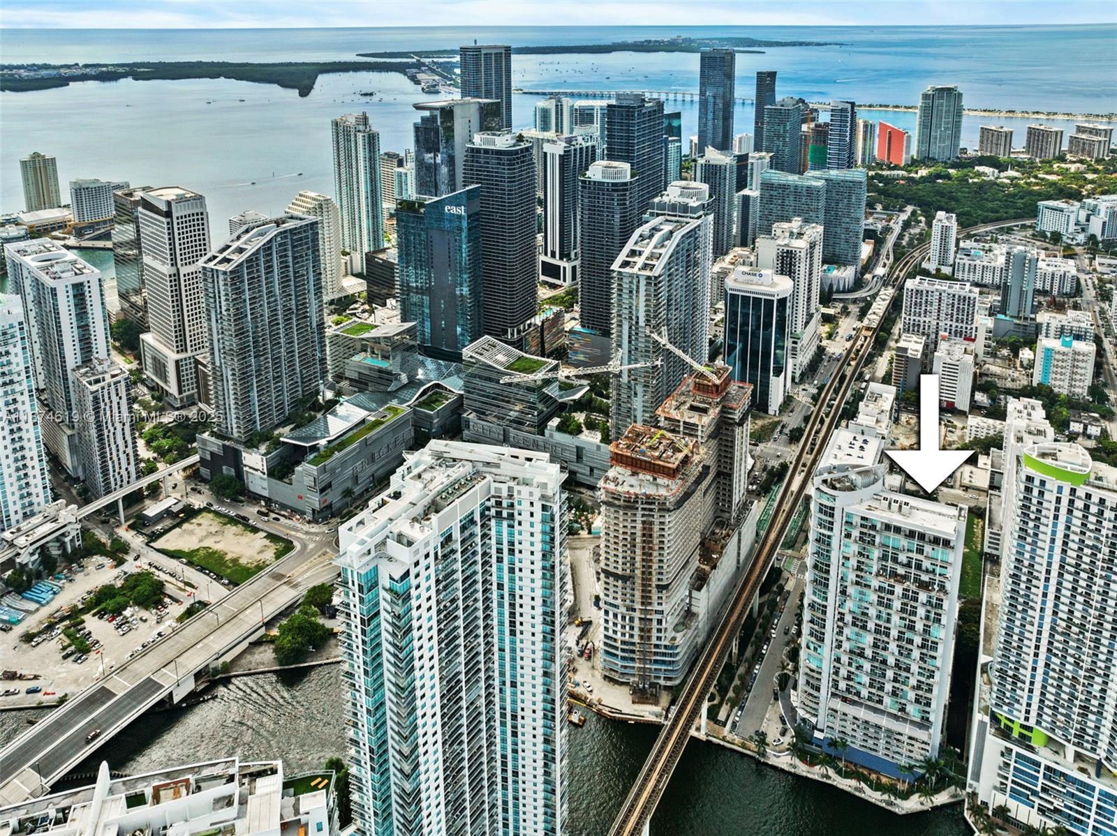 Stunning loft-style residence at Neo Vertika with 20-ft floor-to-ceiling windows showcasing panoramic views of the Miami River, Biscayne Bay, and Downtown skyline. Features include marble floors throughout, modern kitchen with stainless steel appliances & glass backsplash, spacious bedroom with California Closets & glass railings, plus washer & dryer inside unit. Amenities: fitness center with city views, expansive pool with large terrace, BBQ area, tennis courts, courtyard, on-site restaurant & 24-hour security. Steps to Brickell City Centre and just minutes from Miami Worldcenter, offering premier shopping, dining, and entertainment. Building allows leasing, making it an excellent option for both end-users and investors.