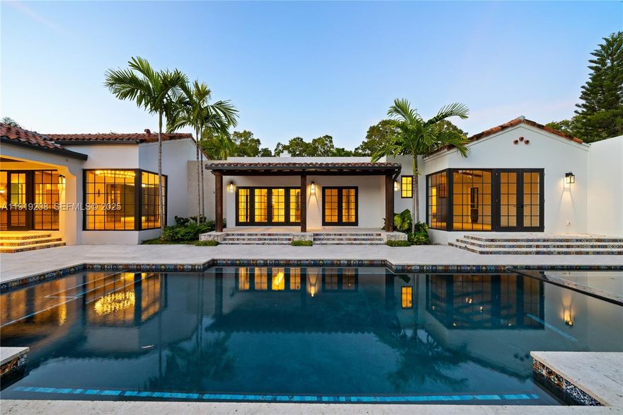 Experience timeless luxury in the heart of Coral Gables, just minutes from dining, shopping, and the historic Miracle Mile. This newly built estate offer 5,358sqft of living space on over half an acre and fuses timeless Spanish character with modern sophistication. Vaulted ceilings with exposed beams crown a dramatic great room wrapped in corner windows and steel-frame glass doors that erase the boundary between indoors and out.

The showpiece chef’s kitchen centers on a custom L’Atelier range and marble surfaces, complemented by Sub-Zero refrigeration and wine cooler, a Wolf oven, and a built-in Miele coffee system. Spa-level bathrooms feature striking marble and Waterworks fixtures, while an integrated Lutron smart system unifies lighting, ambiance, and control throughout the home. The serene primary suite includes a private midnight kitchen with a second Miele coffee station and peaceful garden and pool views.

Resort-style living continues outdoors with expansive terraces, a heated saltwater pool, hot tub and a fully equipped summer kitchen for effortless entertaining. A private guest house with full kitchen, bedroom, and bath offers exceptional flexibility for guests or extended stays. A legacy estate built without compromise. Schedule a tour today!