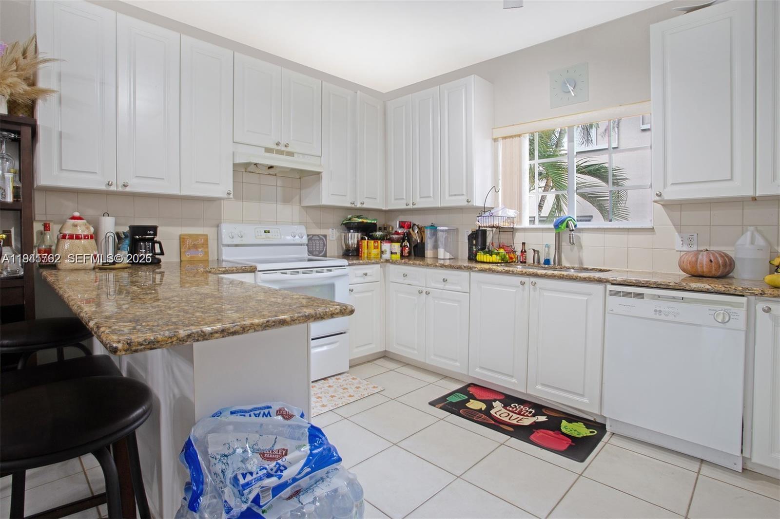 WASHINGTON PALMS CONDO - Residential