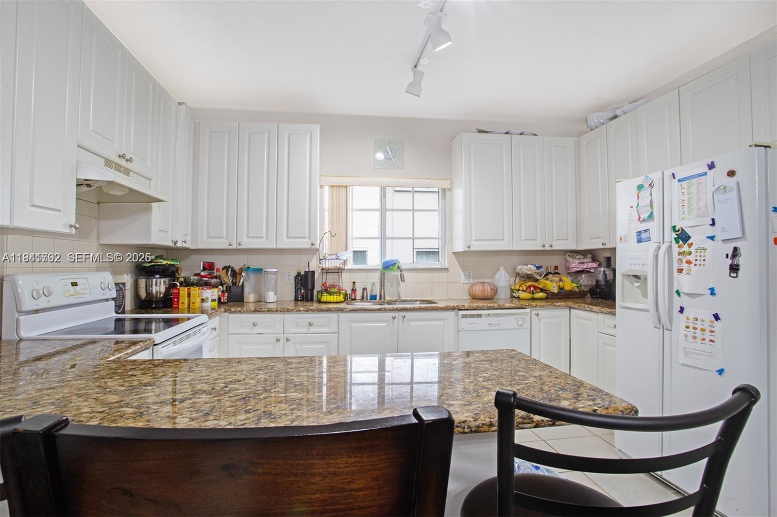 WASHINGTON PALMS CONDO - Residential