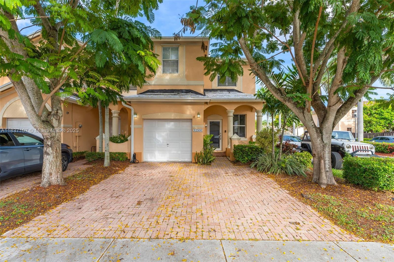 Beautiful corner townhouse in desirable Kendall Breeze! Featuring 3 bedrooms and 2.5 baths, this home offers an updated half bath with laminate flooring, and a beautifully remodeled kitchen with quartz countertops and stainless steel appliances. Enjoy the convenience of a 1-car garage and the security of an impact front door. Roof replacement and exterior painting of the community are already underway for added peace of mind. Brand new A/C installed in 2024. Fantastic community amenities include a clubhouse, three pools, gym, playground, and dog park. Ideally located in the heart of Kendall near the Turnpike, 874, London Square Mall, and an array of dining options. Association in good standing with reserves, no special assessments. Ready to move in!