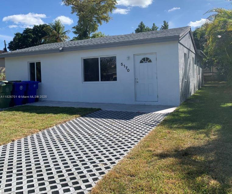 Front unit 2 bed - 1 bath with impact windows, new roof, ceramic tile . 2 parking space. Backyard with fence.