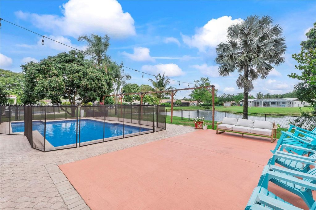 Photo of 3851 NW 100th Ave, Coral Springs, FL 33065 (MLS # A11994973)