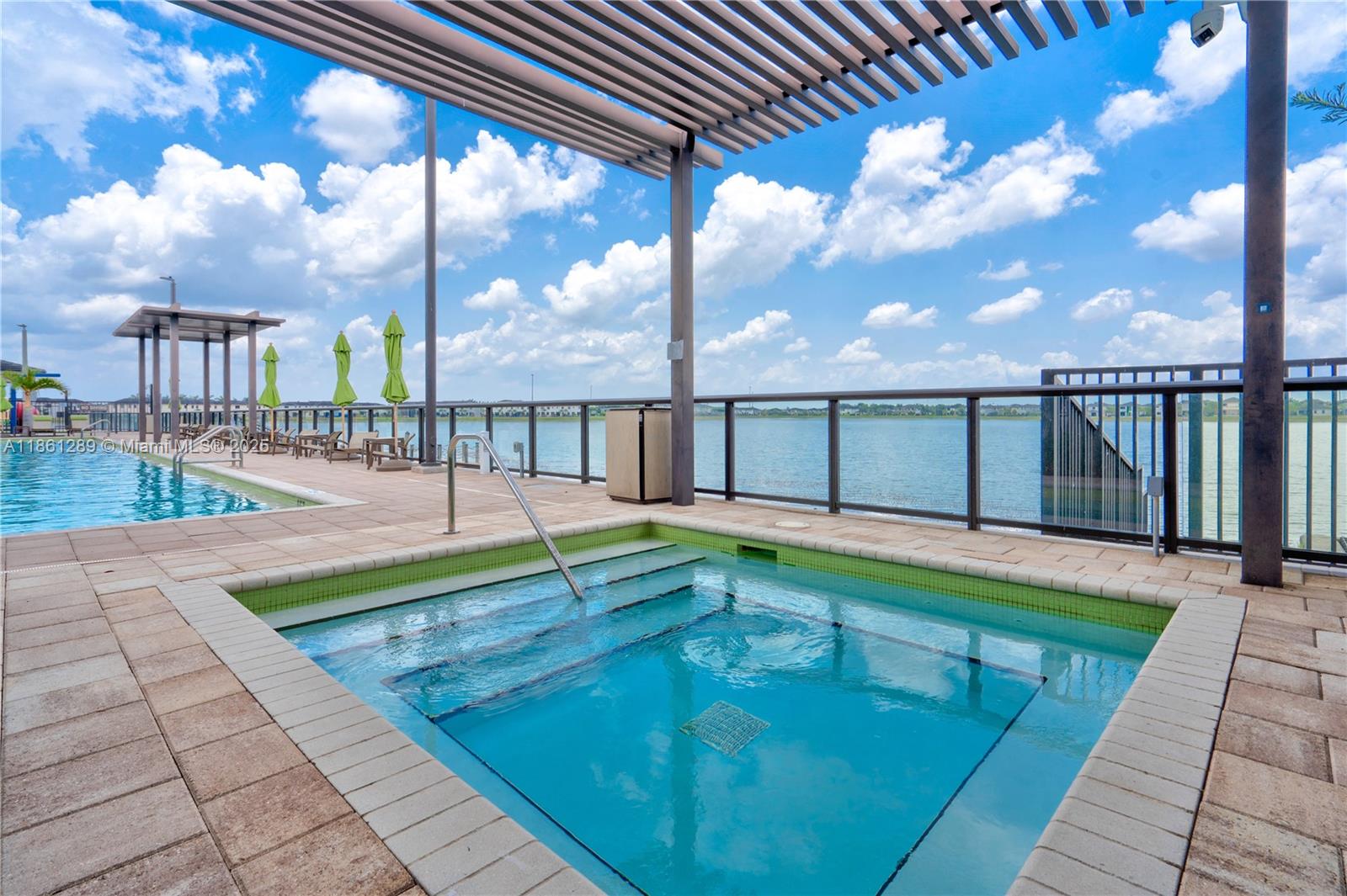 Welcome to Satori, an exclusive luxury gated community in Miami Lakes. This 3-bedroom, 2.5-bath home features a beautifully designed interior with a spacious kitchen, quartz countertops, ample cabinetry, and stainless steel appliances. Enjoy the open living and dining area with a convenient half bath downstairs. The fenced yard provides outdoor privacy, while upstairs you’ll find three bedrooms, including a primary suite with a large walk-in closet. Community amenities include a resort-style pool and spa, splash park, fitness center, and clubhouse. Located near top-rated schools, shopping, and dining—perfect for family living!
