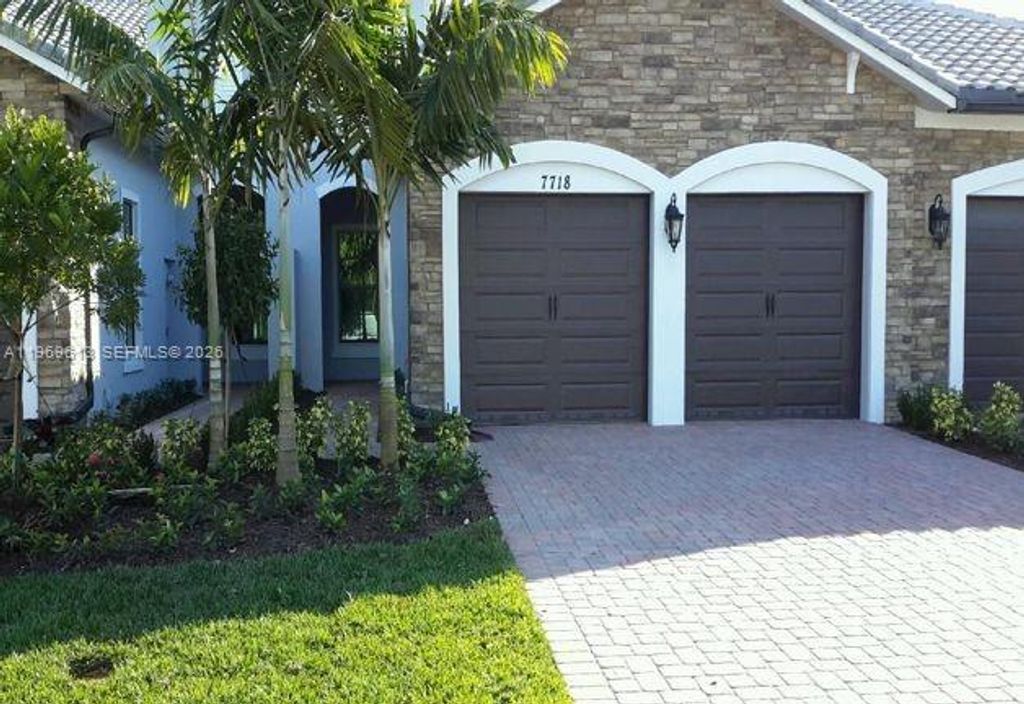 Photo of 7718 N Blue Spring Dr, Parkland, FL 33067 (MLS # A11969613)