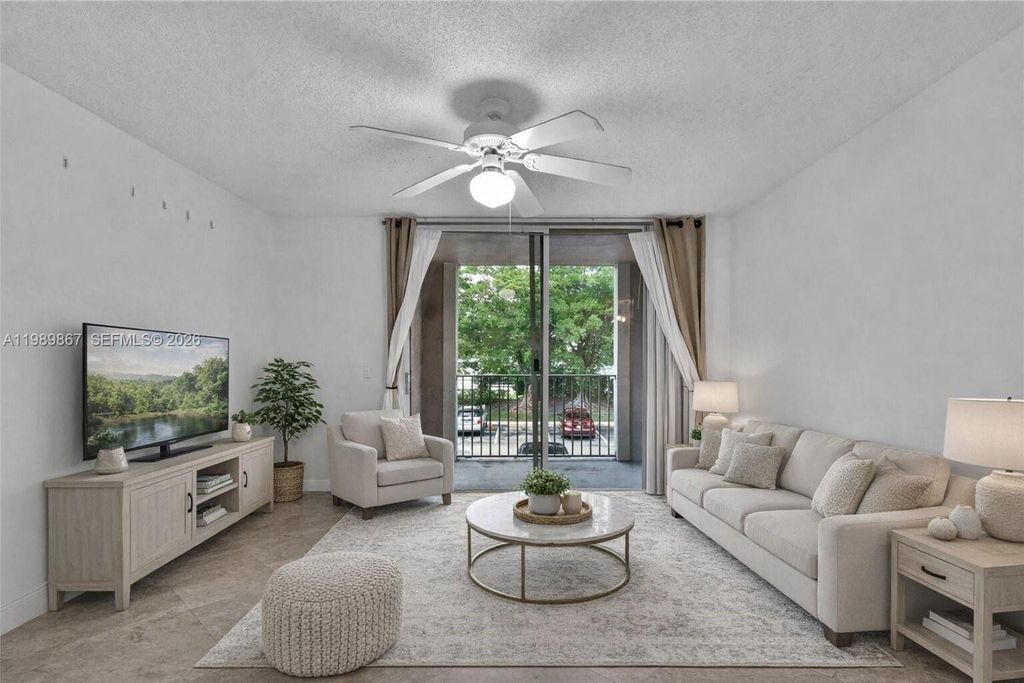 Photo of 12160 Saint Andrews Pl #205, Miramar, FL 33025 (MLS # A11989867)