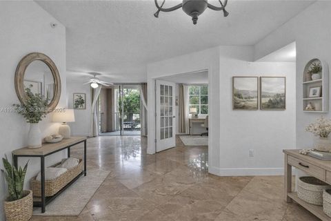 Photo of 12160 Saint Andrews Pl #205, Miramar, FL 33025 (MLS # A11989867)