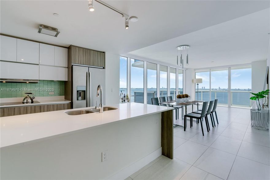 Experience luxury living with breathtaking views of Biscayne Bay from this stunning 3-bedroom, 2.5-bath corner residence at Bay House Miami. Located on the 28th floor, this beautifully appointed unit features sleek Italian flooring, a modern European kitchen with high-end stainless steel appliances, and floor-to-ceiling windows that flood the space with natural light.

Enjoy resort-style amenities including a serene pool deck with cabanas, BBQ area, state-of-the-art fitness center, yoga studio, and aerobic room. Ideally situated in the heart of Edgewater—just minutes from Wynwood, the Design District, Miami’s world-class museums, the Adrienne Arsht Center, and pristine beaches.

This is city living at its finest—style, location, and an unbeatable view.