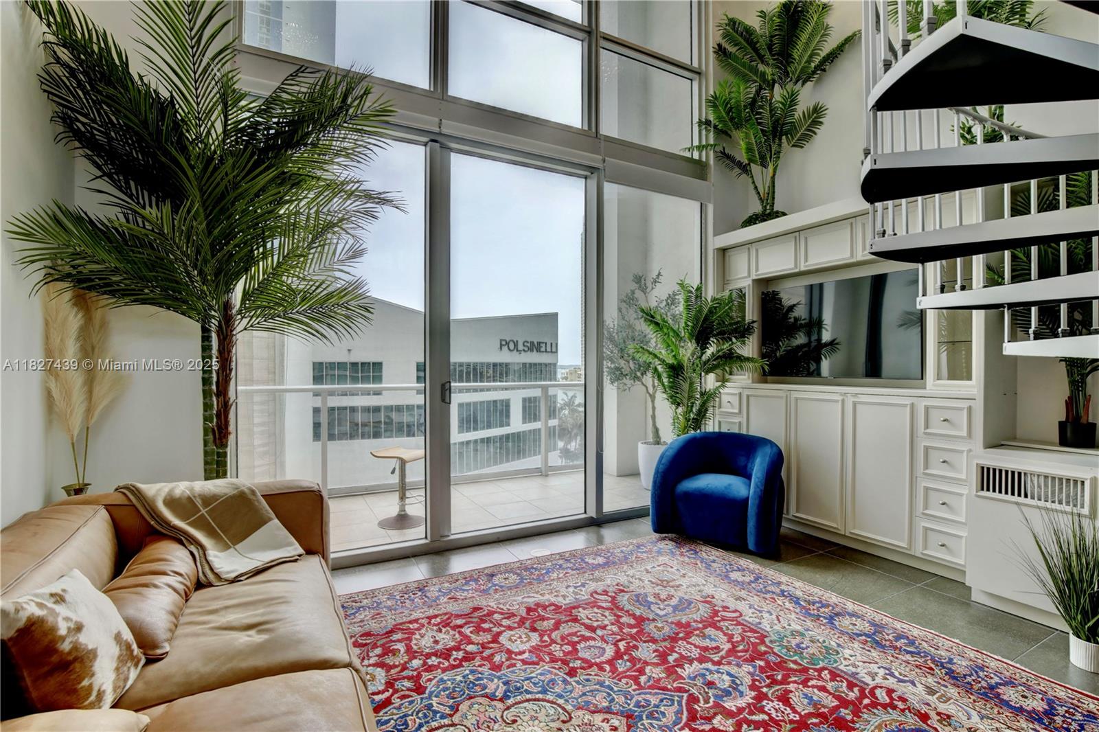 Stunning 2-Story Loft with Direct Bay Views. Experience chic downtown living in this one-of-a-kind, east-facing 2-story loft featuring 19'4" ceilings. Thoughtfully upgraded, this residence boasts tile flooring throughout, custom-built closets, floor-to-ceiling windows, and modernized bathrooms for elevated comfort and style. The upstairs den offers valuable additional room, complemented by an extra storage unit on the mezzanine level. Enjoy the convenience of assigned parking, a rare find in Downtown. All this just steps from Whole Foods, Bayfront Park, Silverspot Cinema, and a world-class lineup of restaurants including Novikov and Hell’s Kitchen.
Building provides 24-hour front desk service, adding peace of mind to the luxury lifestyle.