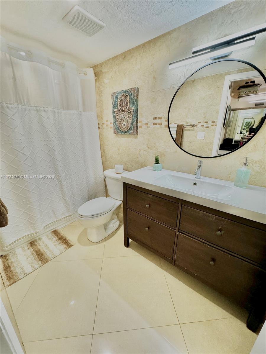 THE VINTAGE CONDO - Residential