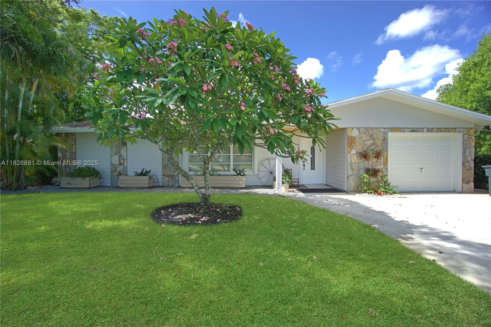 Tucked in the heart of Palm Beach Gardens, this immaculate split-bedroom pool home offers privacy and comfort with an oversized fenced yard. Freshly painted and spotless, it features an upgraded granite kitchen with stainless steel appliances, renovated baths, tile floors throughout, spacious walk-in closets, and French doors leading to a large paver patio. Enjoy an expansive serene backyard with lush landscaping, a sparkling pool with dual water features, covered entertaining space, boat parking behind a double gate, and a storage shed. Crown molding, wood blinds, and ceiling fans add elegant touches. Rent includes lawn care, pool service, and pest control. Offered furnished or unfurnished