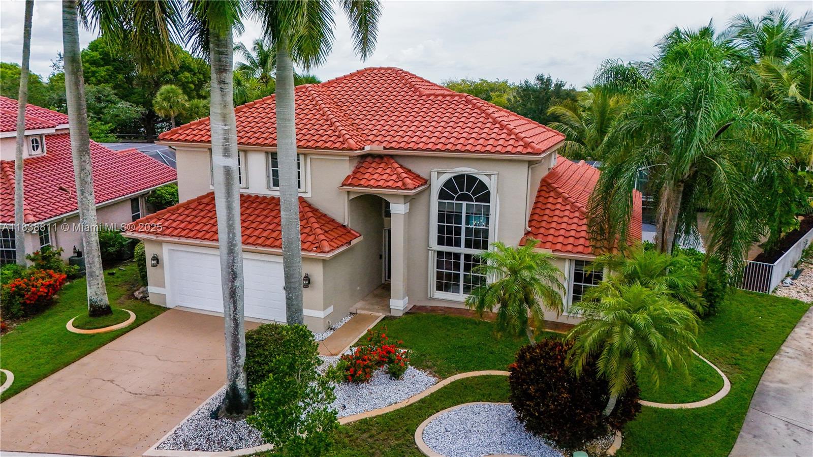 Experience sophisticated living in this stunning 4 Bedroom 2.5 Bathrooms pool home nestled in Silver Lakes Pembroke Pines. This extensively upgraded residence perfectly blends comfort, style, and serene beauty.
Step inside to an elegant Family Room with wood floor. The heart of the home, a custom gourmet kitchen, boasts granite countertops and GE stainless steel appliances. The first-floor Master Bedroom offers a private retreat overlooking a sparkling pool, while second-floor rooms provide breathtaking lake views and an open loft that can become a 5th bedroom. Enjoy South Florida lifestyle with an oversized, screened pool deck. Fenced patio ensures privacy on a private cul-de-sac lot with no rear neighbors.