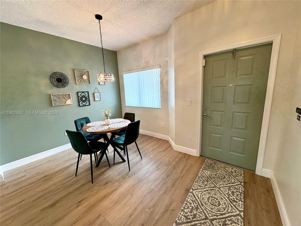 Photo of 7647 Southampton Ter #304, Tamarac, FL 33321 (MLS # A11982982)