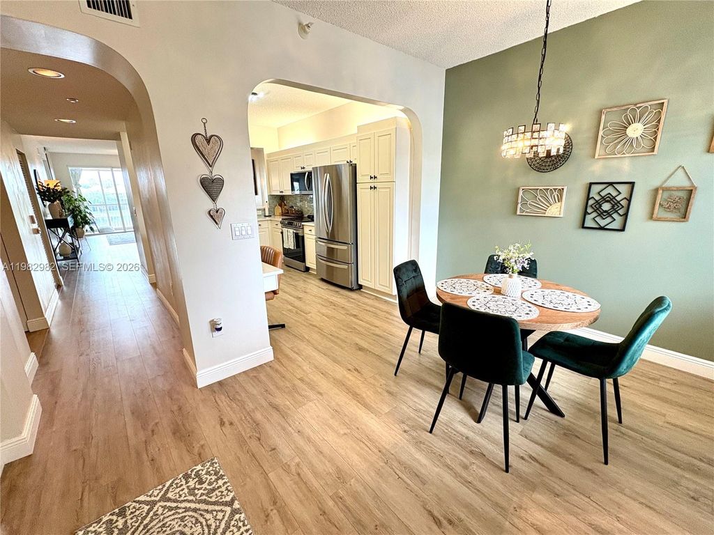 Photo of 7647 Southampton Ter #304, Tamarac, FL 33321 (MLS # A11982982)