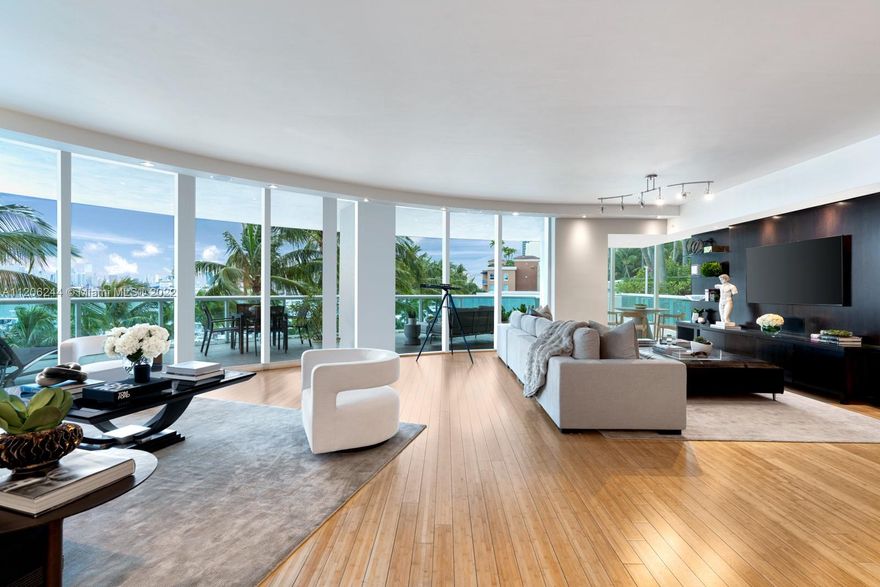 Step Inside With Me!  A South of Fifth legendary floorplan - Murano’s 01 line- offering the best of both worlds: the services of a premier waterfront condominium with the expansive outdoor space unique to a single-family residence.  Floor-to-ceiling windows encase this spectacular curved floor plan with lovely Western views of the bay, marina and downtown skyline. With 3 bedrooms + office, outdoor living is made prominent with both a sprawling wraparound terrace paired with a one-of-a-kind lanai featuring putting green and private access to one of the building’s swimming pools and tennis court. Murano at Portofino offers a chic private restaurant and Beach Club for its residents, as well as all the top amenities of SoFi - the park, marina, and dozens of restaurants at your footstep