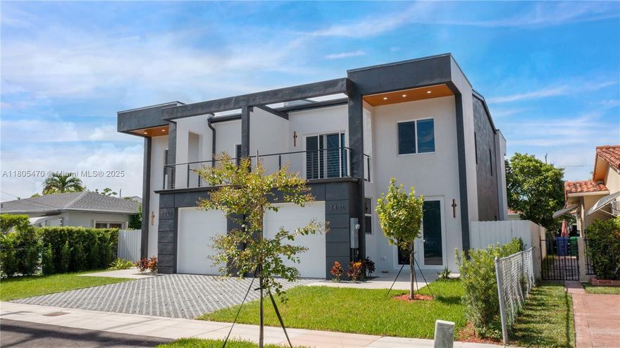 Experience refined luxury at 3431 SW 16th Terrace, Miami. This brand-new townhome, just minutes from Coral Gables, blends modern design with timeless elegance. It features 3 spacious bedrooms, 2.5 luxurious baths, and a flexible garage that easily converts into a fourth bedroom, office, or gym. The chef’s kitchen impresses with Samsung appliances, custom European cabinetry, and waterfall quartz countertops. Sophisticated details include 7 ft. imported Turkish doors, Italian-built closets, and a stunning wood staircase with a custom California-style railing. Hurricane-impact windows and doors ensure peace of mind, while a tranquil covered deck invites relaxation amid beautifully landscaped grounds. A rare opportunity to own new construction in one of Miami’s most desirable locations.