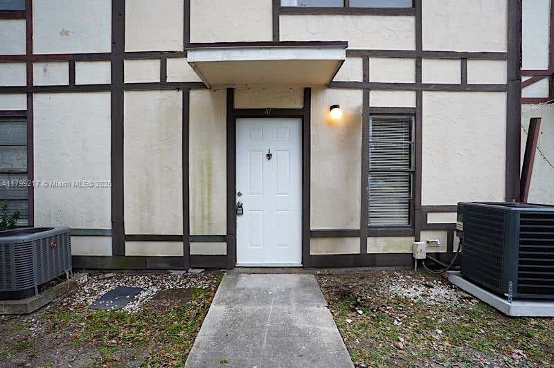 Photo of 5154 Breckenridge Pl #47, West Palm Beach, FL 33417 (MLS # A11799217)