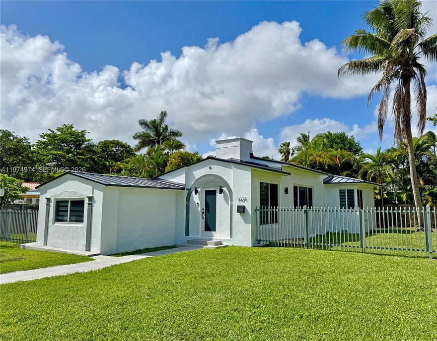 Amazing opportunity to own this newly remodeled turn-key home in Miami’s coveted East Shorecrest neighborhood. The soaring cathedral ceiling with exposed beams makes this 3-bedroom, 2-bathroom house feel bright and airy and offers a seamless blend of Old-World charm and modern amenities. Major upgrades include a new Metal Roof 2025, Impact Windows & Doors 2025, plumbing and tankless water-heater 2024. Recent renovations of the kitchen and bathrooms feature stainless steel appliances, contemporary cabinetry and modern fixtures. Other upgrades include new porcelain wood-grain flooring through-out, LED light fixtures, tiled entry walk-way, interior and exterior paint and motorized zebra window treatments. The A/C system and air ducts recently had a full maintenance service (no central heating). The property is on a quiet street just walking distance from Biscayne Bay and sits on a generous 8,332 sf lot with ample room for your dream pool. Best of all, no HOA!