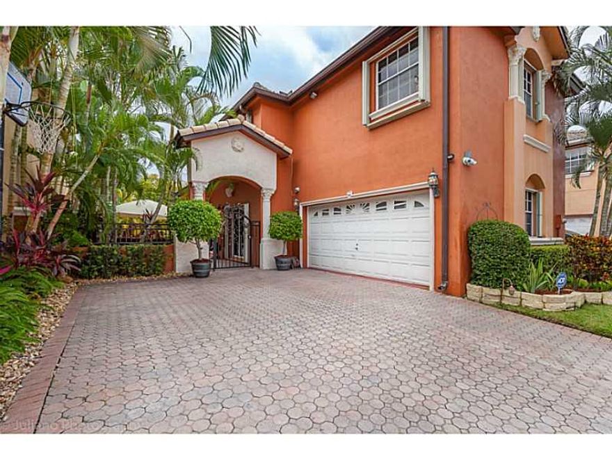 Beautiful and immaculate 2 story pool home with state of the art upgrades, very unique home with over $100,000 in renovations with the finest materials available to date. Stunning kitchen with stainless steel appliances, granite counter tops and a wine co oler as well. A spacious formal living room and dining room, garage was converted into a big family room, california closets, ADT security system, built in BBQ, water fall with special jade stones, accordion shutters all over the house and much more!!