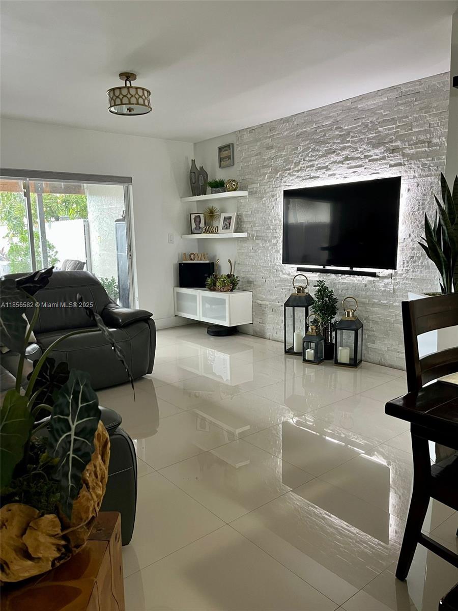 This Townhouse is located in one of the most prestigious condos in Miami Dade next to Turnpike and 836 Expressway , it has 3 bedrooms and 3 bathrooms, completely remodeled, 3 parking spaces, large patio, covered terrace and a beautiful view of the lake.