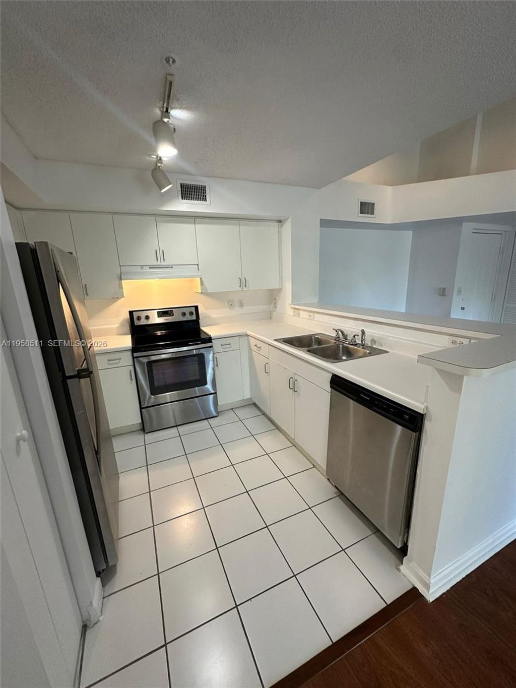 Photo of 4848 N State Road 7 #4306, Coconut Creek, FL 33073 (MLS # A11958511)