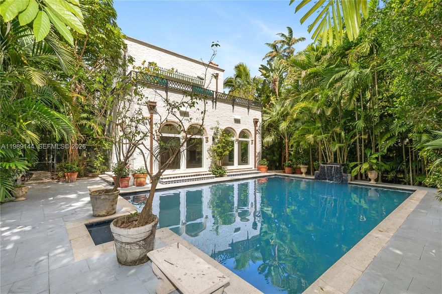 Exceptional opportunity to own a classic, Mediterranean-style home, one of South Coconut Grove’s most unique properties. This ultra-private estate sits on an extraordinary 21,000 sf lot with a 700 sf pool surrounded by lush tropical gardens. Light-filled interior flows easily from the main living areas to inviting outdoor spaces. This vintage Mediterranean style home offers original Dade County pine floors, a grand living room with 11 ft ceilings, wood burning fireplace and adjoining sunroom creating a most enjoyable serene setting and timeless appeal. The formal dining room has an adjoining butler pantry, and the kitchen opens to a garden patio perfect for alfresco dining. On the second floor, there are 2 bedrooms, bath and a Primary Suite with a wood burning fireplace, bathroom with rainfall shower and steam and private terrace overlooking the pool and grounds. Impact windows throughout, full home generator and multiple CC cameras. Available architectural plans to upgrade the house to a total of 6,217 sf and 5-bedroom suites, presenting a rare opportunity to enjoy the existing residence, expand, or create a new custom estate. Whether you choose to enjoy the home as it is, personalize and expand over time, or design a new custom residence, this exceptional property offers rare flexibility for both end users and developers.