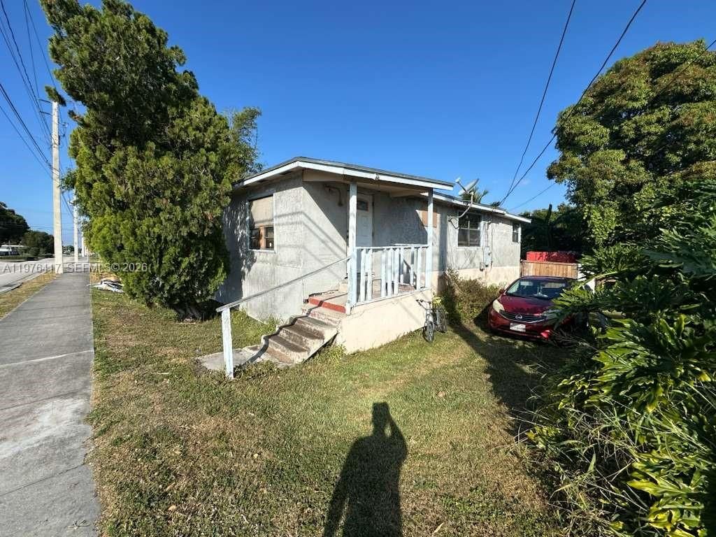 Photo of 640 Palm Beach Rd, South Bay, FL 33493 (MLS # A11976417)