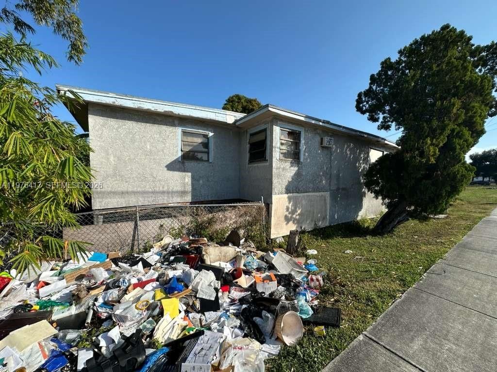 Photo of 640 Palm Beach Rd, South Bay, FL 33493 (MLS # A11976417)