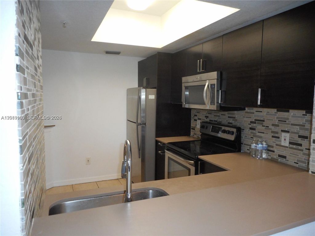 Photo of 785 SW 148th Ave #1403, Sunrise, FL 33325 (MLS # A12011160)