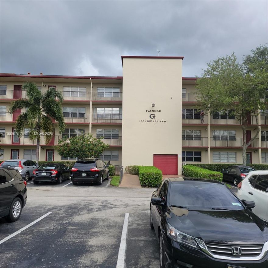 Welcome to Century Village – a vibrant 55+ gated community offering resort-style living in the heart of Pembroke Pines! This charming  2b, 1.5-bath condo in the Ivanhoe G building features serene views, spacious layout, and abundant natural light. The unit boasts cozy condo family living but has older appliances. Carpeted flooring flows throughout the living areas, and the balcony provides a peaceful retreat overlooking lush landscaping.  Enjoy access to a multi-million dollar clubhouse with a theater, fitness center, tennis courts, pickleball, indoor and outdoor pools, walking park and more. Association includes water, cable, and security. Conveniently located near shopping, dining, and major highways. Assigned parking and elevator access.