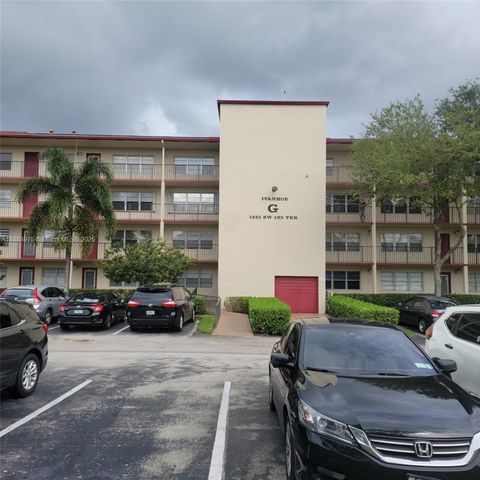 Photo of 1551 SW 135th Ter #310G, Pembroke Pines, FL 33027 (MLS # A11883975)