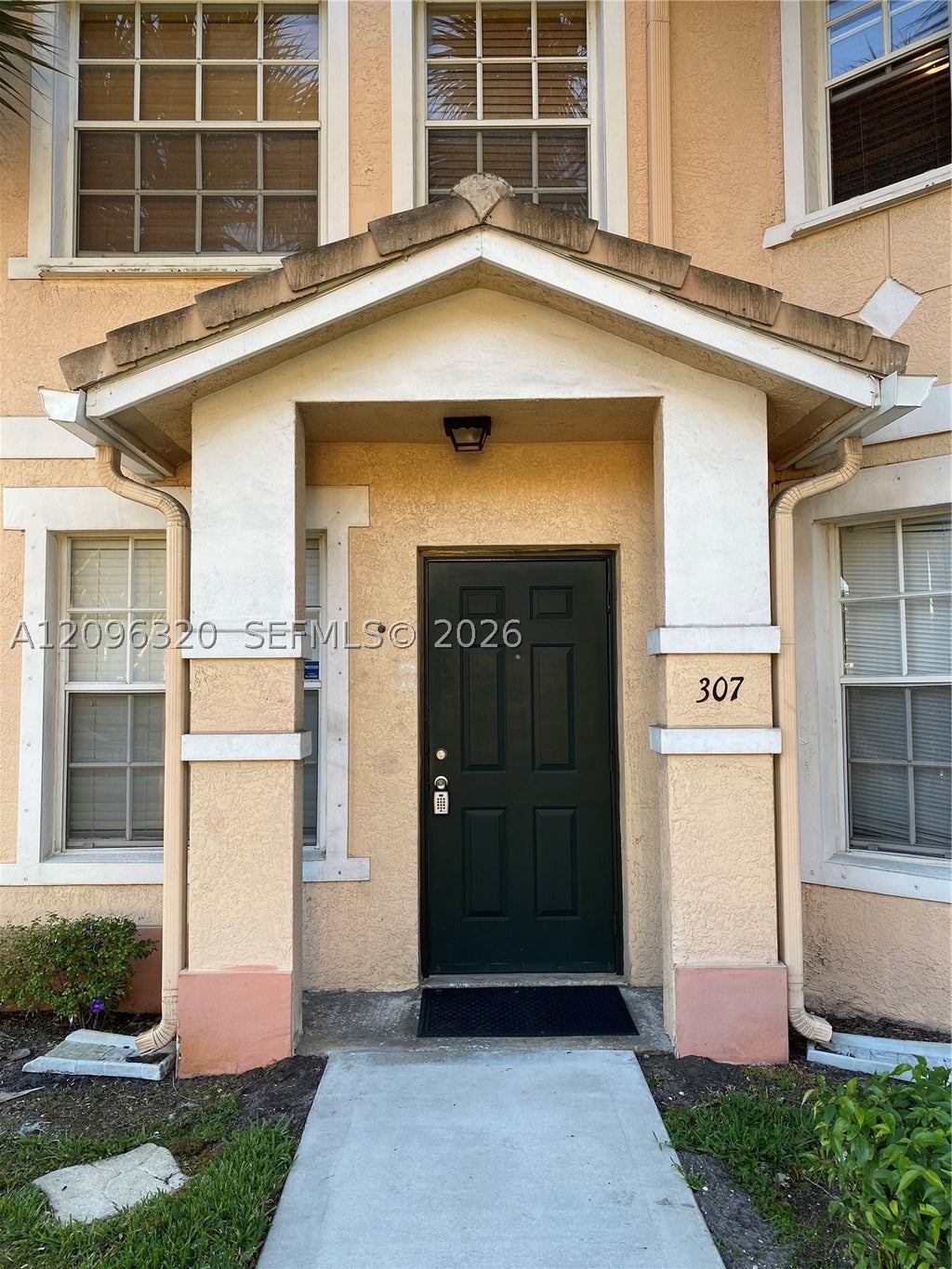 Photo of 307 Belmont Ln, North Lauderdale, FL 33068 (MLS # A12096320)