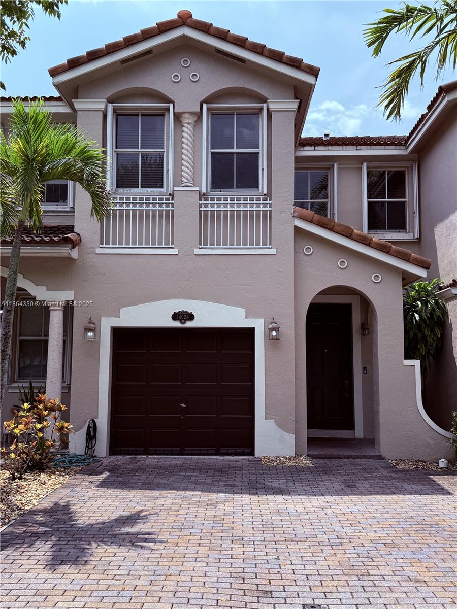 Welcome to this inviting townhouse with beautiful lake views. This home features 3 bedrooms and 2.5 bathrooms. The remodeled kitchen offers stainless steel appliances, modern quartz countertops, and stylish new cabinets. The roof was replaced in 2019, and the A/C was upgraded in 2018. The top floor features new laminate flooring, while the first floor is finished with ceramic tile. Upstairs, all bedrooms have closets with built-in organizers for efficient storage and enhanced organization. The generous primary suite stands out with a spacious walk-in closet and dual sink vanity. Accordion shutters provide added storm protection. The sellers are offering a $5,000 credit to buyers for closing costs.
