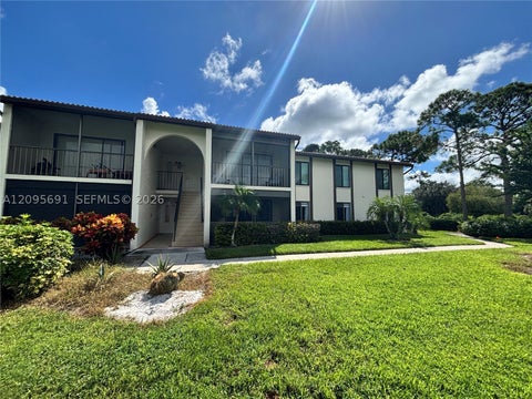 Photo of 2733 SW Matheson Ave #115-E1, Palm City, FL 34990 (MLS # A12095691)