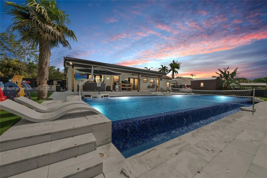 Experience Florida living in this 3/2 home with vaulted ceilings, a luxurious infinity pool, and your own private basketball court, with the option to rent a golf cart for added convenience. The home is enhanced with alkaline water, impact-rated French doors, and windows that bathe the interiors in natural light. Enjoy the benefits of low electrical bills thanks to solar panels. Additional features include an automatic mosquito misting system, landscape lighting, and a versatile AC-equipped garage that can serve as an office or extra room. The charming eat-in kitchen with a breakfast nook connects to the family room, while the spacious gated side yard is ideal for parking your boat or RV. For ultimate Florida lifestyle, this home offers all the amenities you desire.