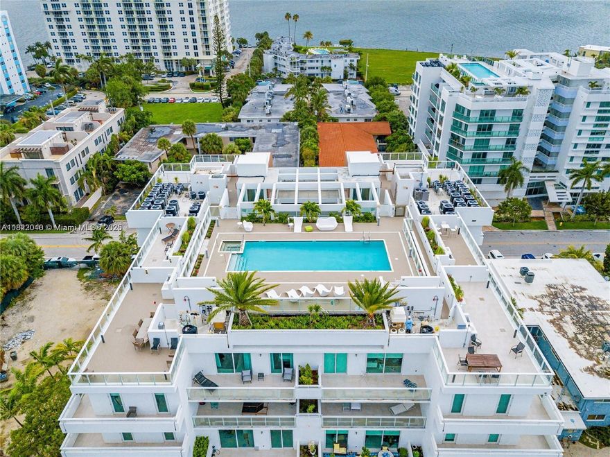 Incredible value at $616/sq. ft.! This 2-bed, 2.5-bath condo offers 1,703 sq. ft. of spacious living—one of the best deals in Bay Harbor Islands and the Bal Harbour area. Features include open living/dining, a custom kitchen, private balcony with city views, and a large primary suite with walk-in closet and en-suite bath. In-unit washer/dryer. Boutique building with rooftop pool, jacuzzi, gym, sauna, attended lobby, and 2 garage parking spaces. Internet included in HOA. Walk to top schools, beach, shops, and dining. Investor-friendly: 12 rentals/year, 30-day min.
