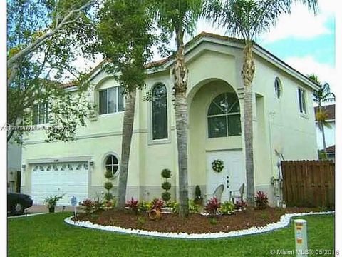 Photo of 11301 Rockinghorse Rd, Cooper City, FL 33027 (MLS # A11872416)