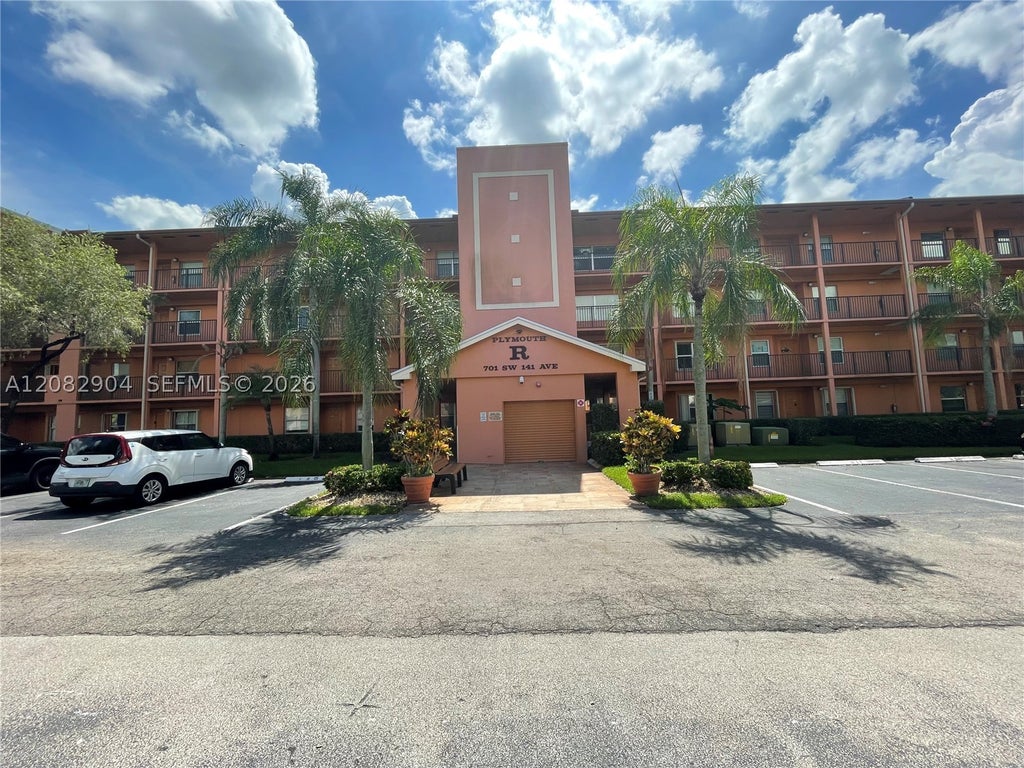 Photo of 701 SW 141st Ave #110R, Pembroke Pines, FL 33027 (MLS # A12082904)