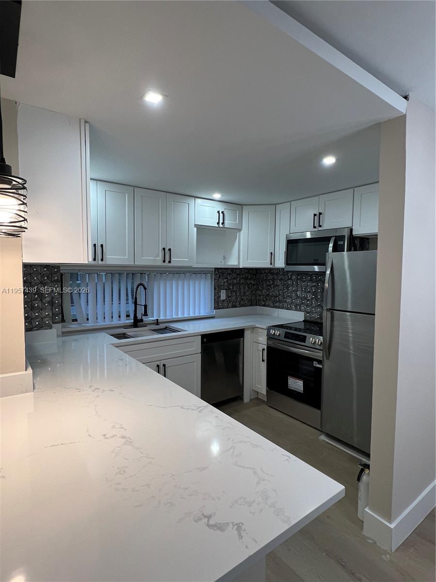 PLAZA OF AMERICAS CONDO P - Residential