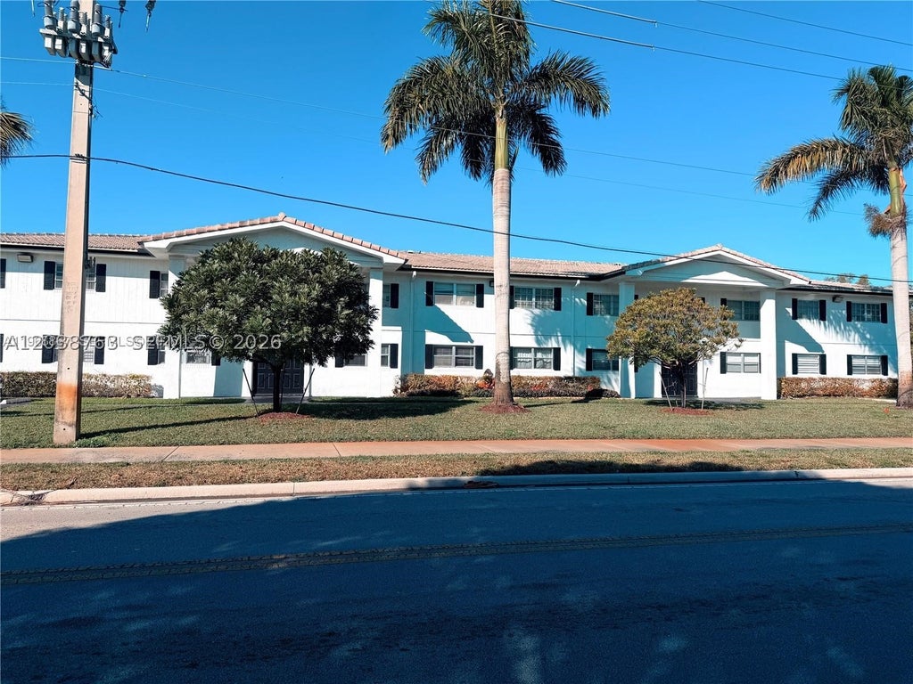 Photo of 4240 Woodside Dr #4, Coral Springs, FL 33065 (MLS # A12038763)