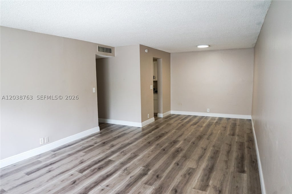 Photo of 4240 Woodside Dr #4, Coral Springs, FL 33065 (MLS # A12038763)