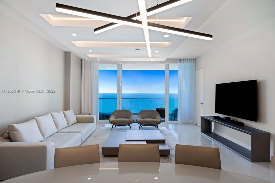 This exquisite home in the sensational Residences by Armani Casa has been fully built-out with extensive upgrades including custom built light fixtures in the living room, wallpaper, and built-out closets all by Artefacto. The three-bedroom, three-and-a-half-bath plus den (or optional fourth bedroom) residence is flow-through, with a private elevator entry and spectacular ocean and Intracoastal Waterway views, a chef’s kitchen with Wolf and Subzero appliances, 10-foot ceilings, 10-foot-deep balconies, a summer kitchen, and a master suite with a midnight kitchen and decadent bath. The building’s spectacular amenities have interiors fully designed by Armani, including a private restaurant for residents, lounge, gym, and spa. Over $400,000 in furnishings by Artefacto may be negotiated.