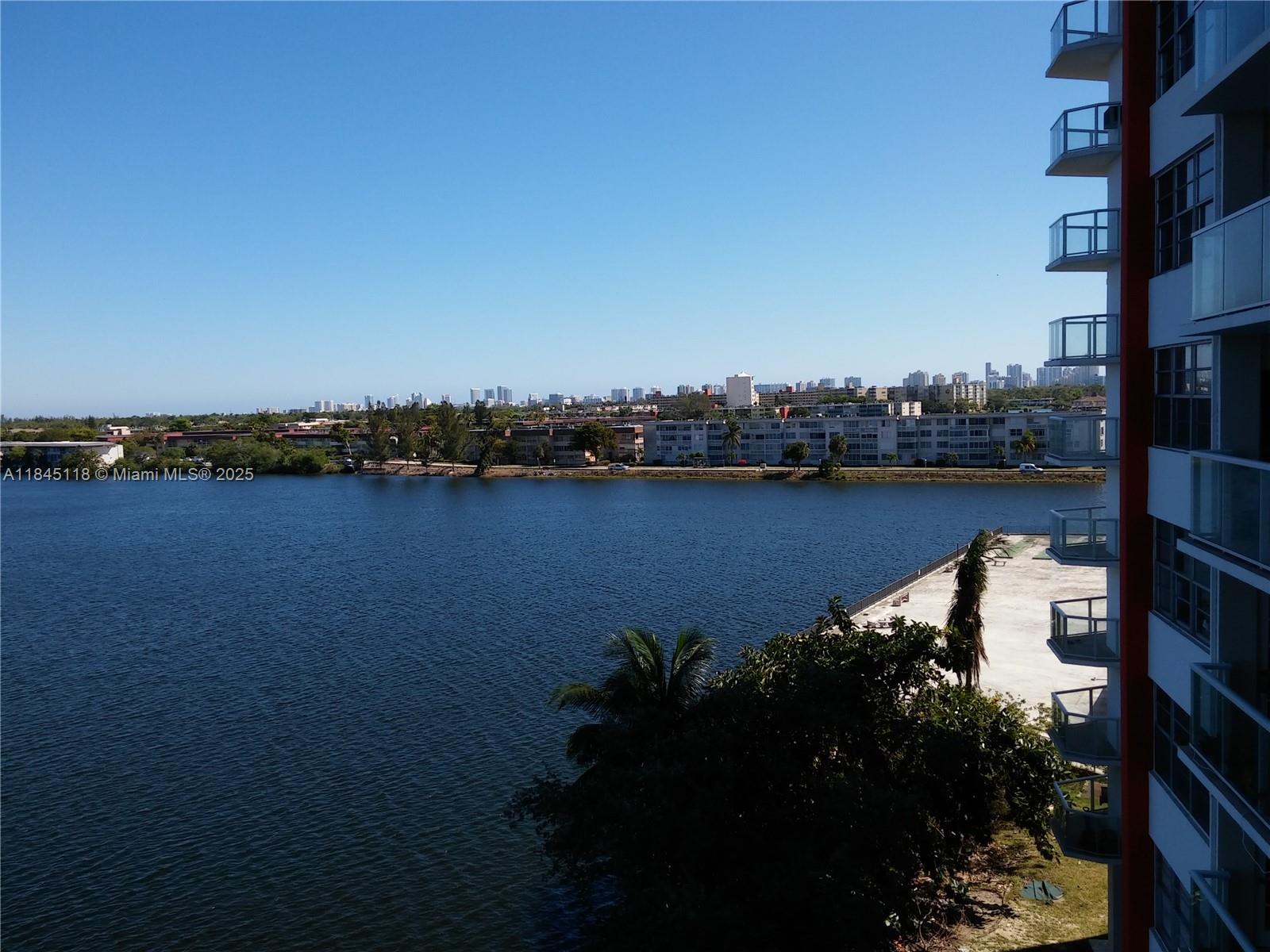 Prime Location & Breathtaking Views! This beautifully maintained 1-bedroom, 2-bath condo offers stunning sunset views from your private balcony. Remodeled bathrooms and sleek tile flooring adds a modern, low-maintenance touch. The community offers Shabbat Elevator and great amenities: 2 pools, a clubhouse, a convenience store, and laundry facilities on every floor. The condo also has assigned parking, key fob entry, and an intercom system. Storage space is conveniently located on the same floor. Buckley Towers places you close to everything, within walking distance to Publix, restaurants, pharmacies, banks, and more. Easy access to I-95, the Turnpike, and the Palmetto Expressway.