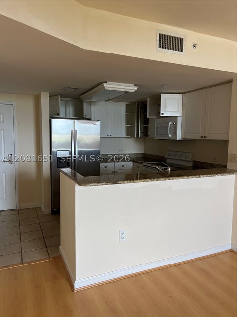 Photo of 19501 W Country Club Dr #611, Aventura, FL 33180 (MLS # A12081651)