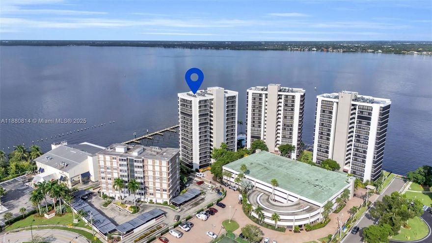 Perched on the 9th floor of a Fort Myers riverfront community, this 4-bedroom, 3.5-bath residence offers nearly 4,000 square feet with unobstructed Caloosahatchee River views. Updated with hurricane-rated windows, smart technology, and refined finishes, the home blends comfort and style. The gourmet kitchen features premium appliances, custom cabinetry, and a bar. Open living and dining areas are accented by wood details and elegant flooring. The primary suite offers a spa bath with dual shower heads, multiple jets, and a custom walk-in closet. Private balconies capture sunsets and river vistas. Two garage spaces, two storage units, 24-hour security, a riverfront pool, fitness center, and proximity to downtown complete this rare offering.