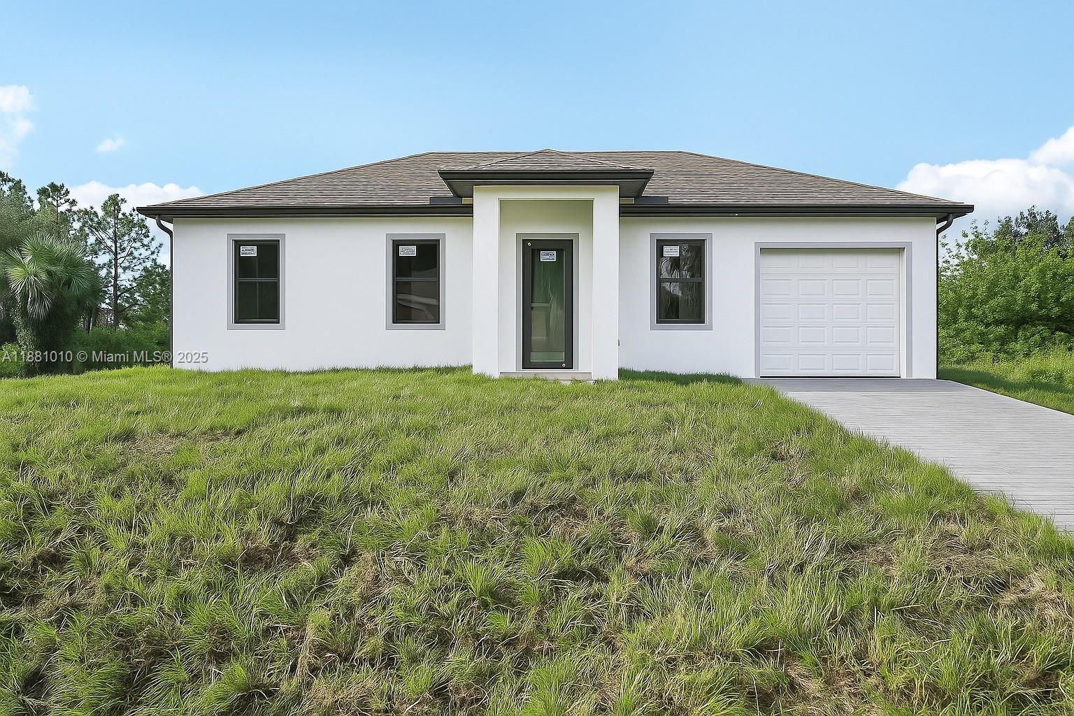 PRE-CONSTRUCTION Home in a fast-growing area of Lehigh Acres! This 3 bed / 3 bath home on a 1/4-acre lot features an open floor plan and porcelain tile floors throughout. The contemporary kitchen boasts beautiful white cabinets, quartz countertops and stainless steel appliances — washer and dryer included. Impact windows and doors, a one-car garage, and a generous yard perfect for outdoor living or a future pool complete this move-in ready package. Modern finishes and thoughtful design make this an exceptional new offering in Lehigh Acres. Seller Willing to give a credit for Closing costs!!