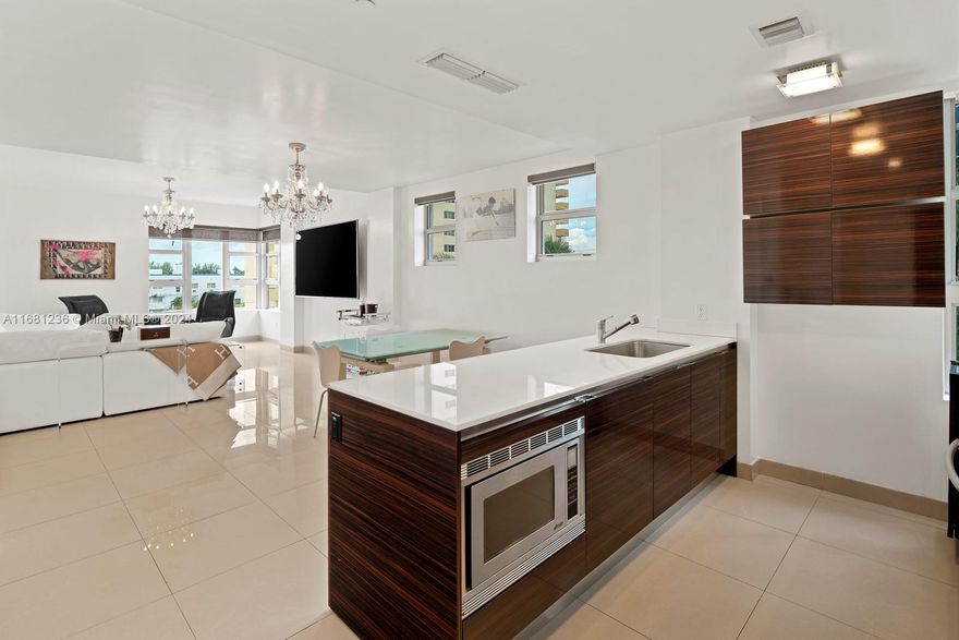Welcome home: Nestled in the heart of Miami Beach on the iconic Collins Ave, this stunning, oceanfront 1 bed, 1.5 bath unit spans 982 sqft in the North Tower of the coveted Caribbean condo. Step outside & enjoy the luxury of towel/chair beach service, or lounge poolside. You’ll find yourself within walking distance to the vibrant Faena District & the bustling 41st Street, filled with shops, dining, and entertainment. Miami Beach’s new boardwalk provides a delightful way to navigate the neighborhood, perfect for leisurely walks or biking beachside. This Caribbean is not just a place to live, it's a lifestyle, offering a unique blend of luxury, five star services, convenience, and the vibrant energy of Miami Beach. Don’t miss this rare opportunity! Rare gas range stove, washer dryer in unit.