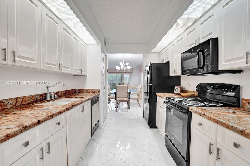 Photo of 12955 SW 16th Ct #314M, Pembroke Pines, FL 33027 (MLS # A11952593)