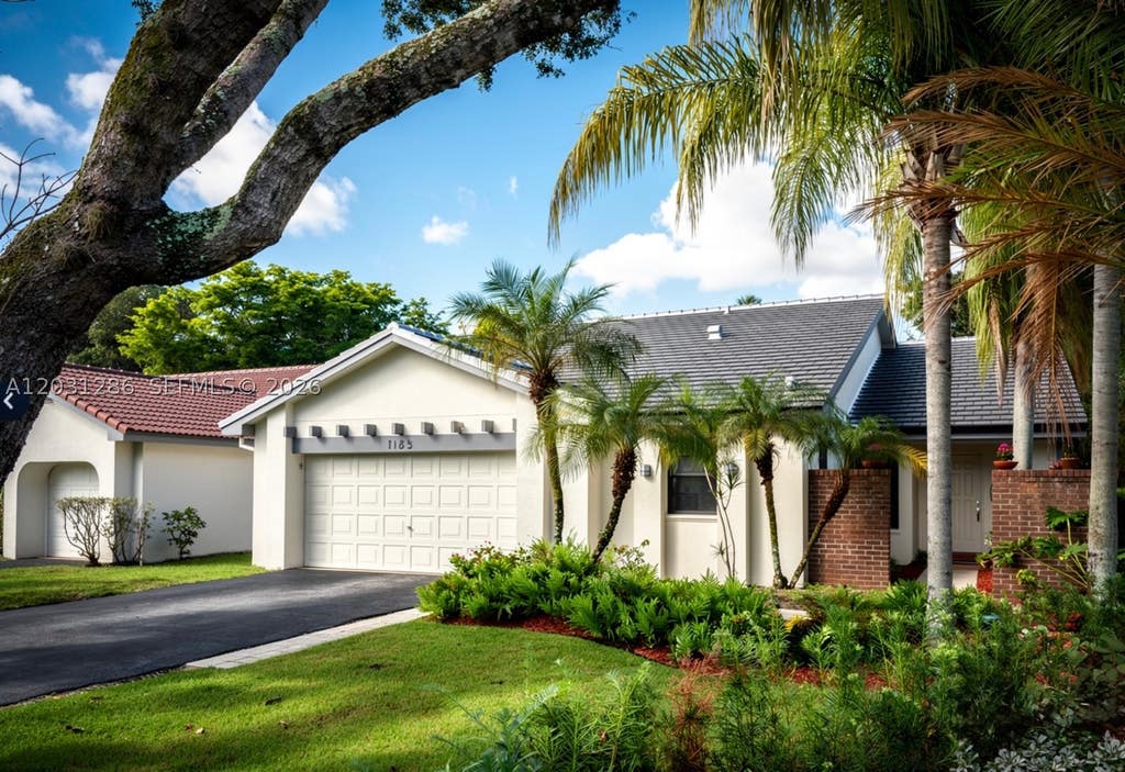 Photo of 2182 Montpeliar, Weston, FL 33326 (MLS # A12031286)